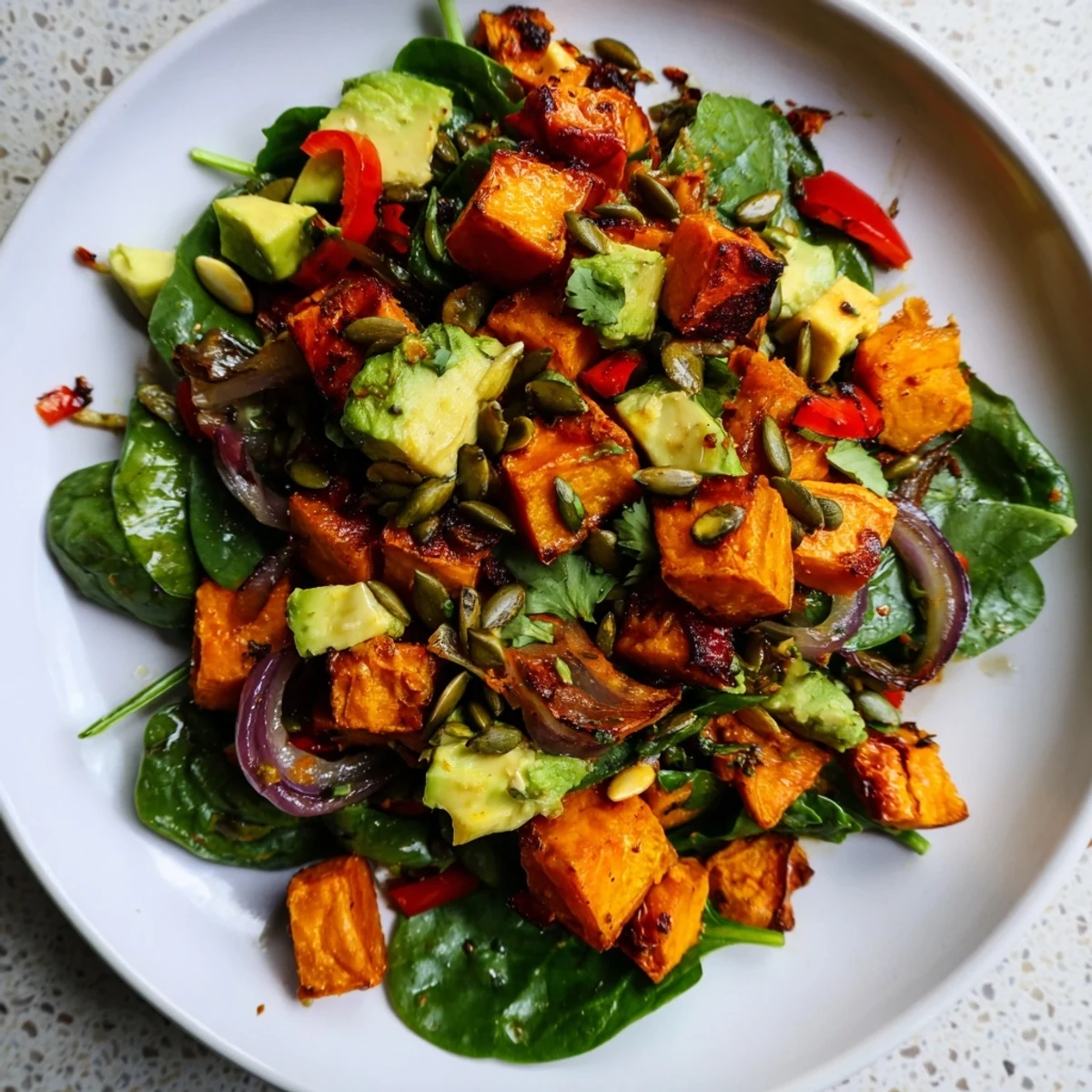 Vibrant Roasted Sweet Potato Salad with Lime served in a white bowl, ready for a healthy weeknight meal.