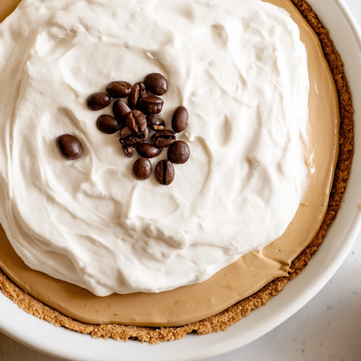 Close-up of Keto Cold Brew Coffee Pie revealing the nutty crust and rich coffee flavor, perfect for a keto dessert.