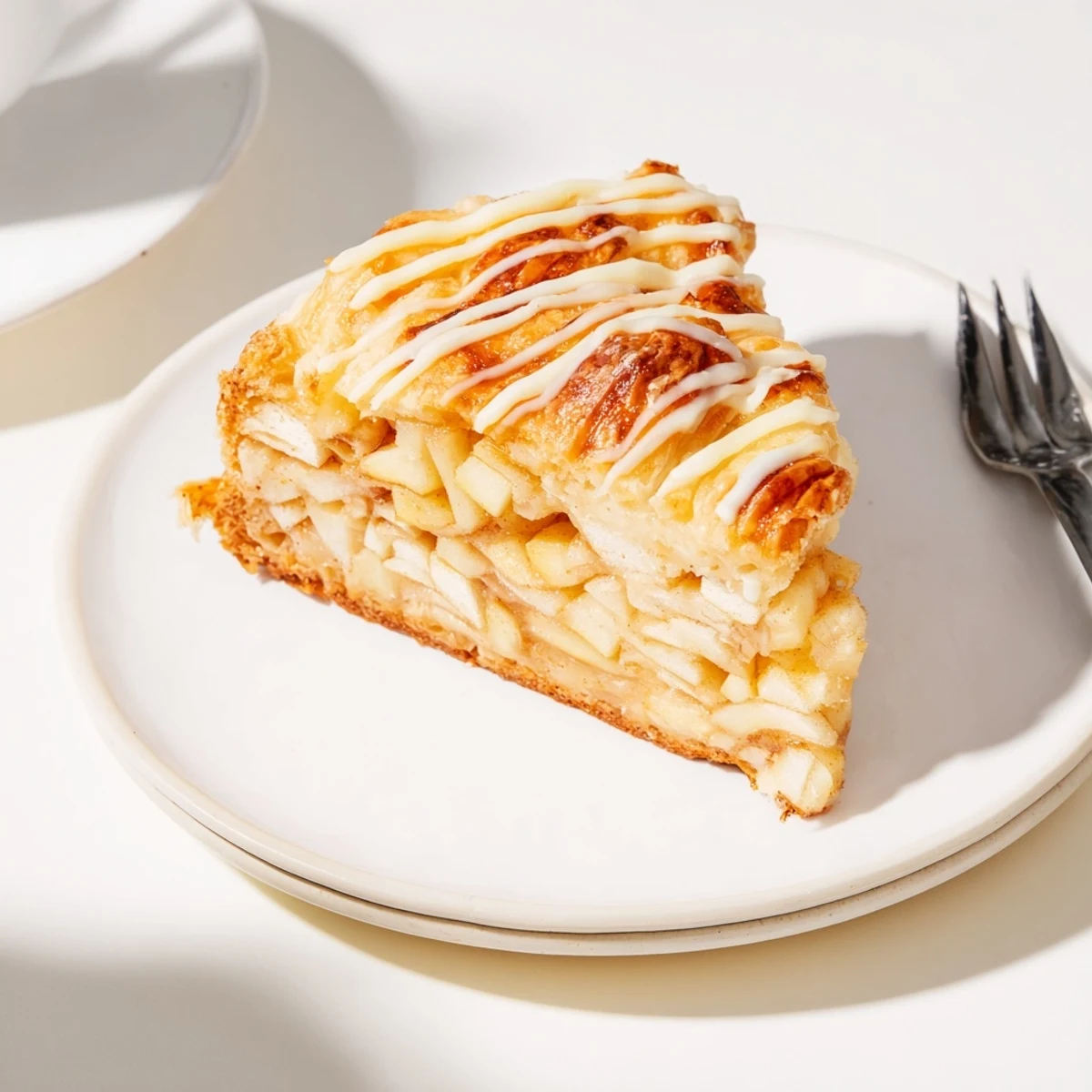 Golden brown Apple Cheese Danishes baked until flaky and topped with sweet spiced apples